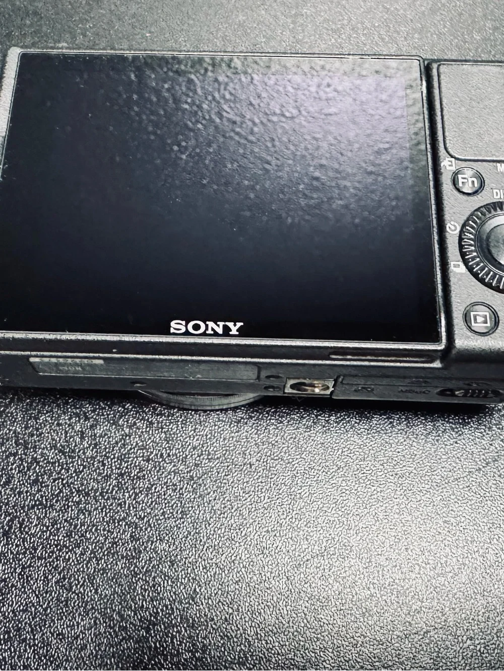Sony Black Compact Digital Camera with Zeiss Lens and Wind Muff
